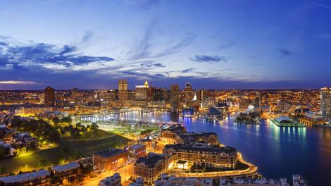 A panoramic evening view of the Baltimore Inner Harbor A panoramic evening view of the Baltimore Inner Harbor