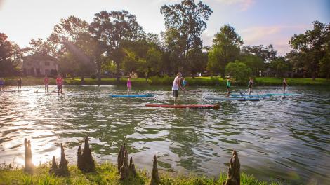 Group stand up paddle boarding Group stand up paddle boarding