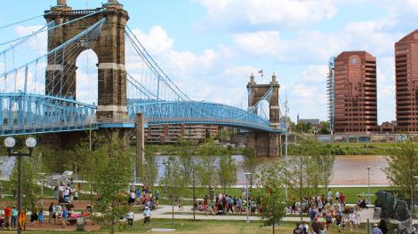 Enjoying the riverfront park next to the Roebling Suspension Bridge Enjoying the riverfront park next to the Roebling Suspension Bridge