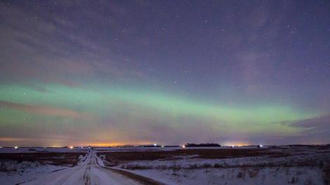 The northern lights, or aurora borealis, illuminate the winter night sky The northern lights, or aurora borealis, illuminate the winter night sky
