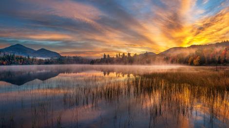 Golden view of Connery Pond in the Adirondacks in New York Golden view of Connery Pond in the Adirondacks in New York