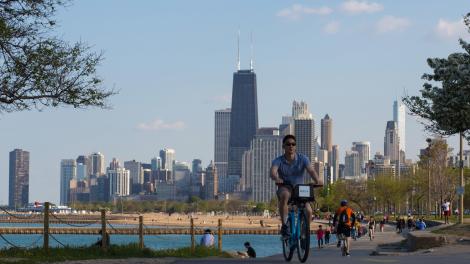 Bicycling along the Lake Michigan shoreline in the Lincoln Park neighborhood of Chicago, Illinois Bicycling along the Lake Michigan shoreline in the Lincoln Park neighborhood of Chicago, Illinois