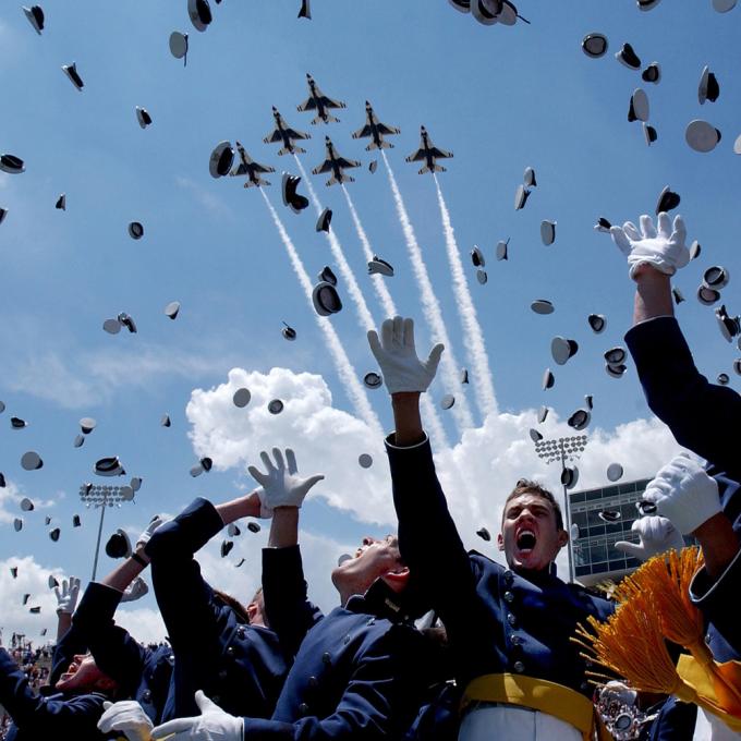 Graduates of the United States Air Force Academy toss their hats Graduates of the United States Air Force Academy toss their hats