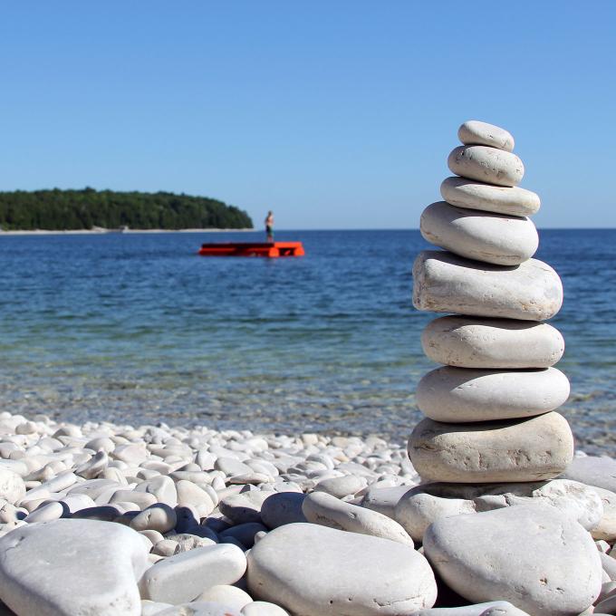 Pebbles stacked on Schoolhouse Beach in Door County, Wisconsin Pebbles stacked on Schoolhouse Beach in Door County, Wisconsin