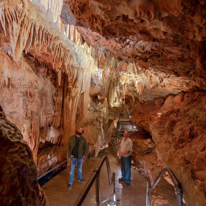 Admiring the formations of Bridal Cave near Lake of the Ozarks in Missouri Admiring the formations of Bridal Cave near Lake of the Ozarks in Missouri
