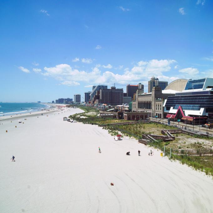 View of Atlantic City’s beach and boardwalk in New Jersey View of Atlantic City’s beach and boardwalk in New Jersey