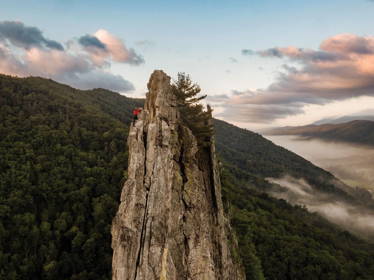 A rock climber near the summit of Seneca Rocks in West Virginia A rock climber near the summit of Seneca Rocks in West Virginia