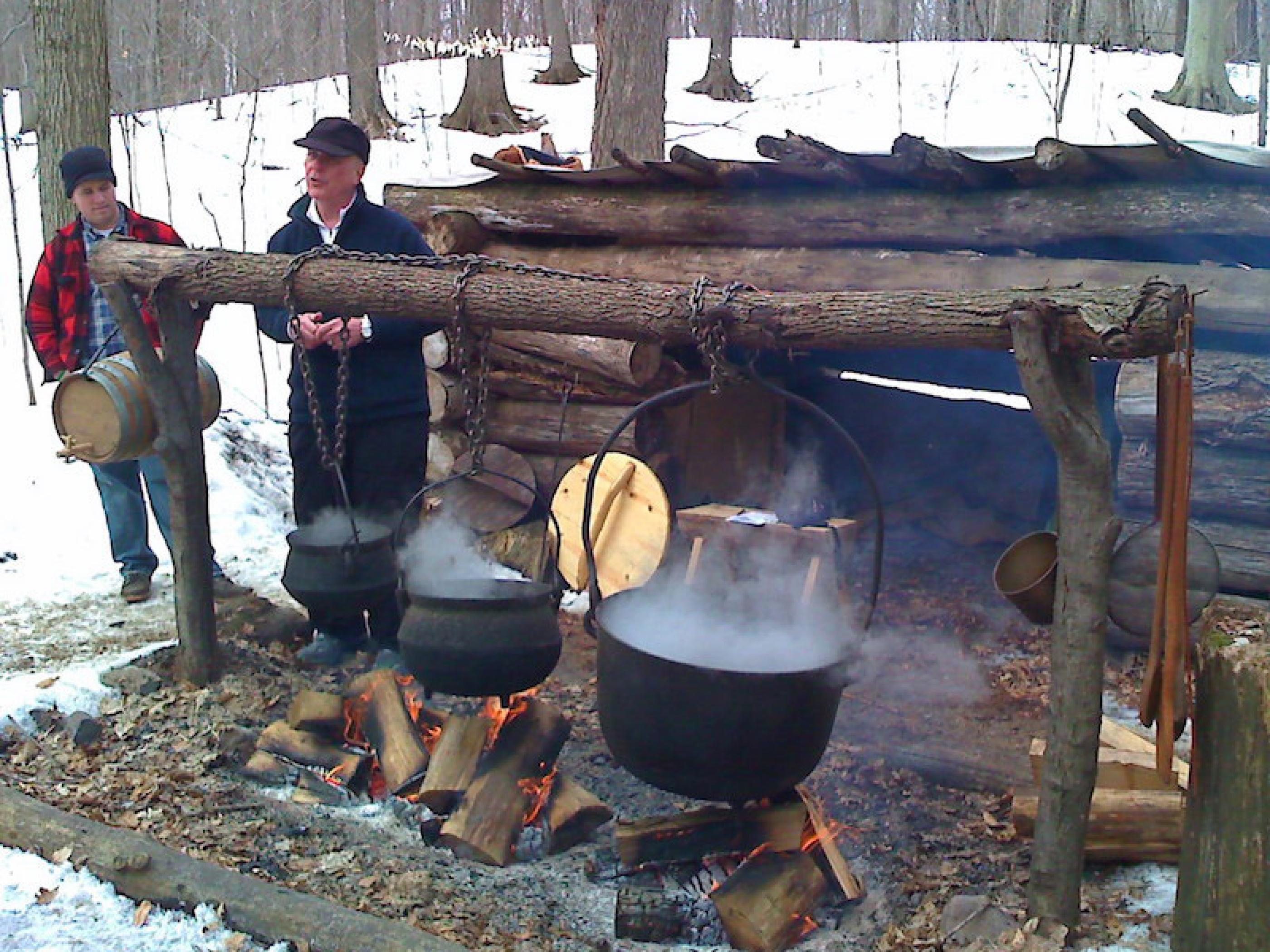 Getting a how-to at the Maple Sugar Festival Getting a how-to at the Maple Sugar Festival