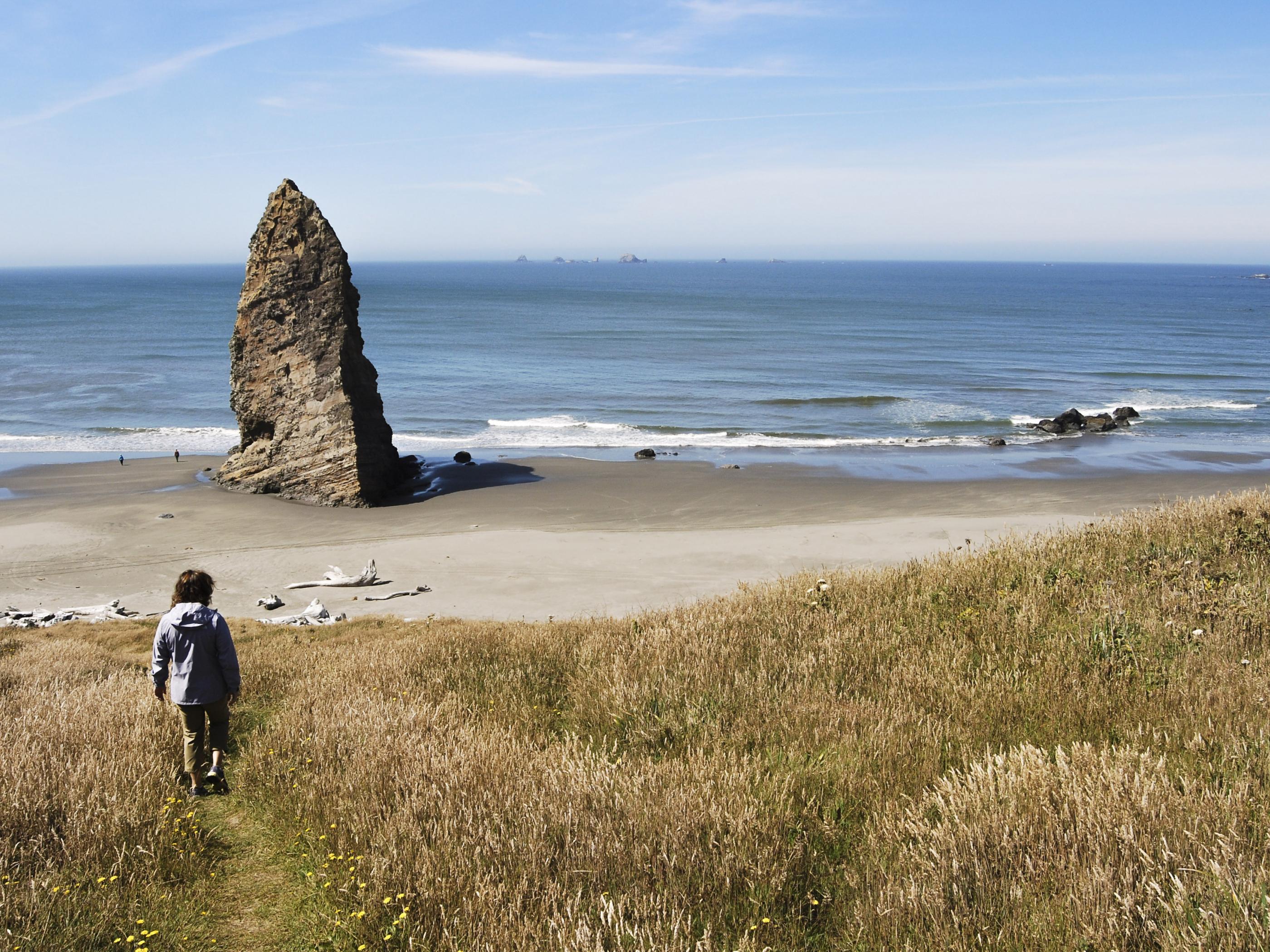 Walking Toward Cape Blanco Rock on the Oregon Coast Trail Walking Toward Cape Blanco Rock on the Oregon Coast Trail