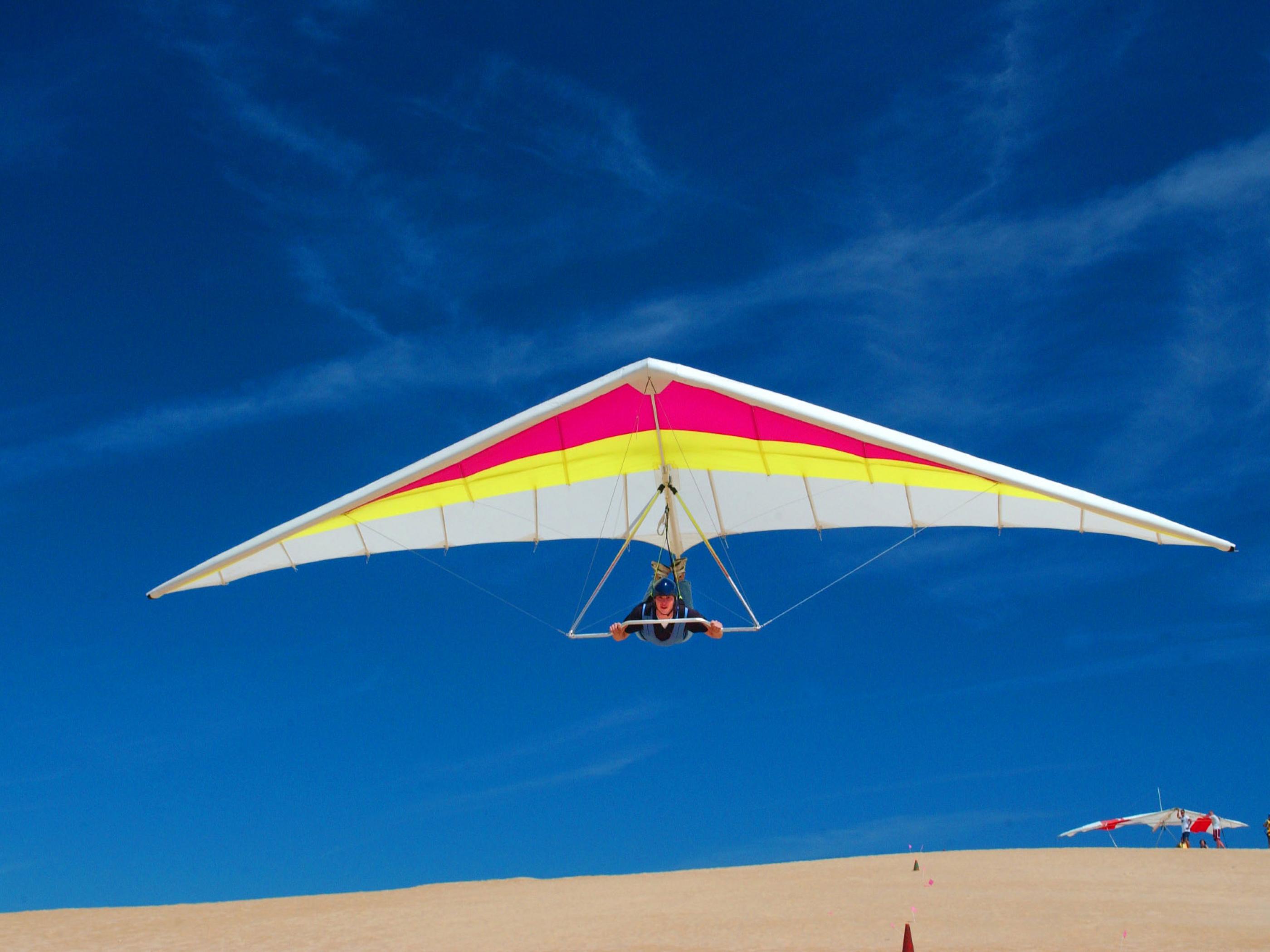 Hang gliding over the dunes at Jockeys Ridge State Park in Nags Head Hang gliding over the dunes at Jockeys Ridge State Park in Nags Head