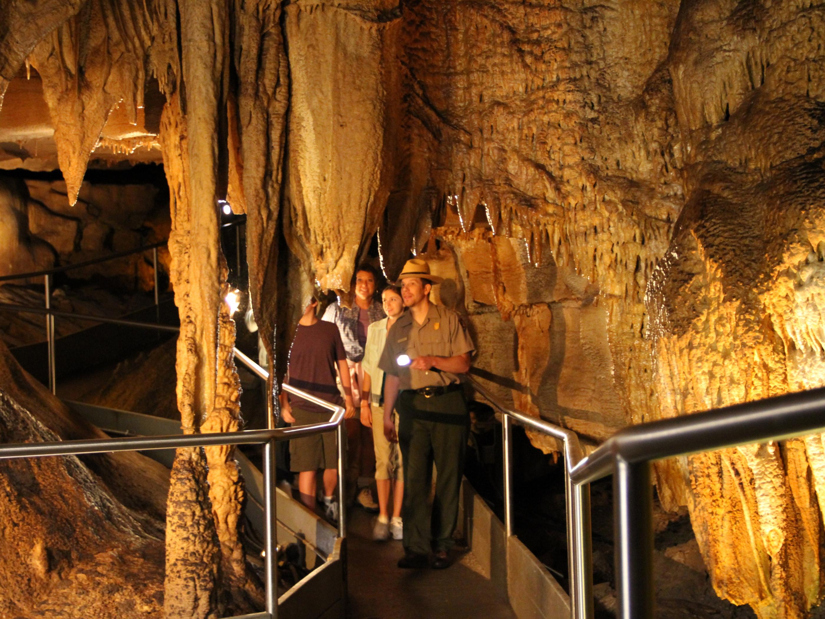 A ranger leads a group through Mammoth Cave A ranger leads a group through Mammoth Cave