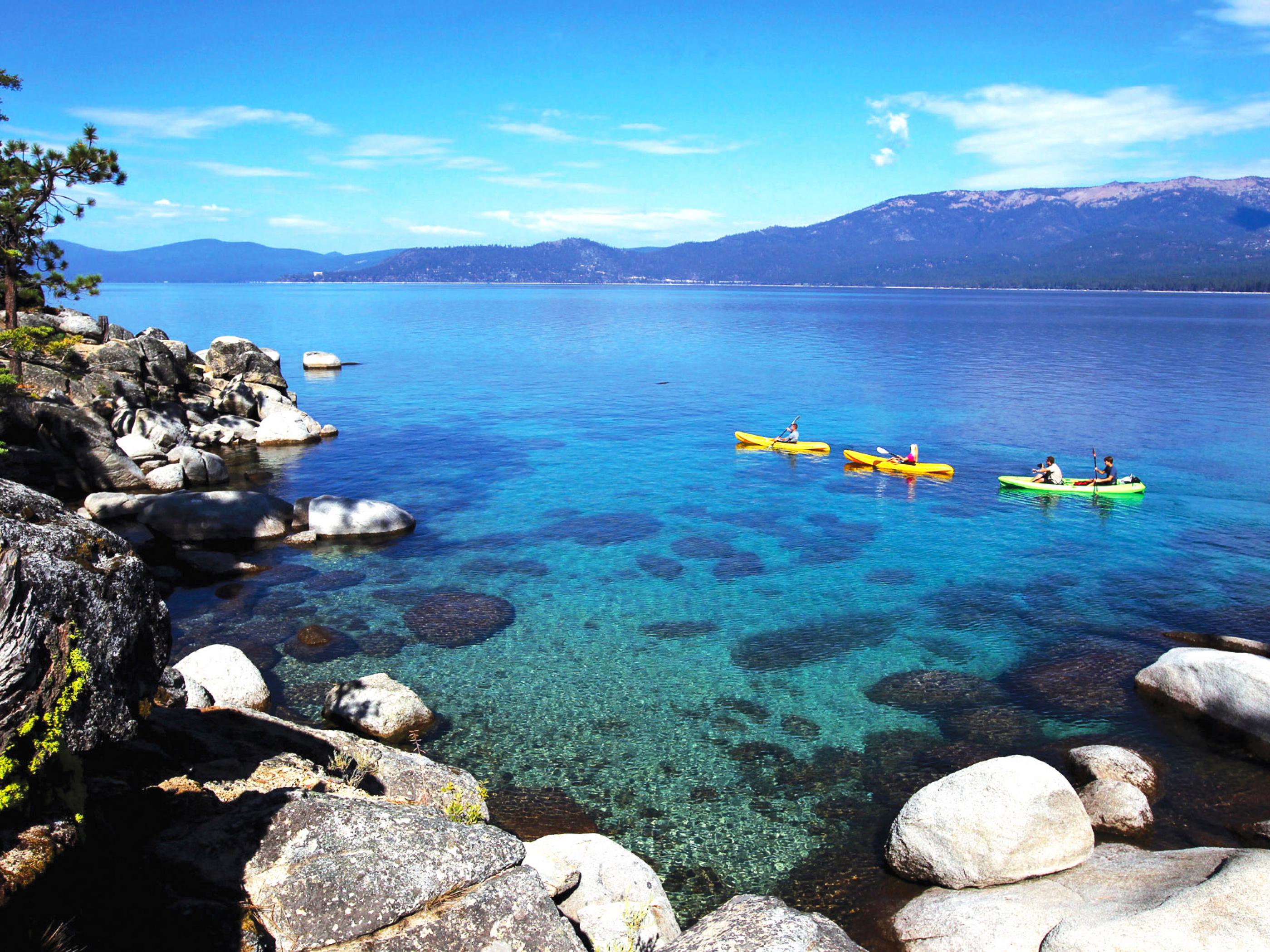 Kayaking on the crystal-clear waters of Lake Tahoe Kayaking on the crystal-clear waters of Lake Tahoe