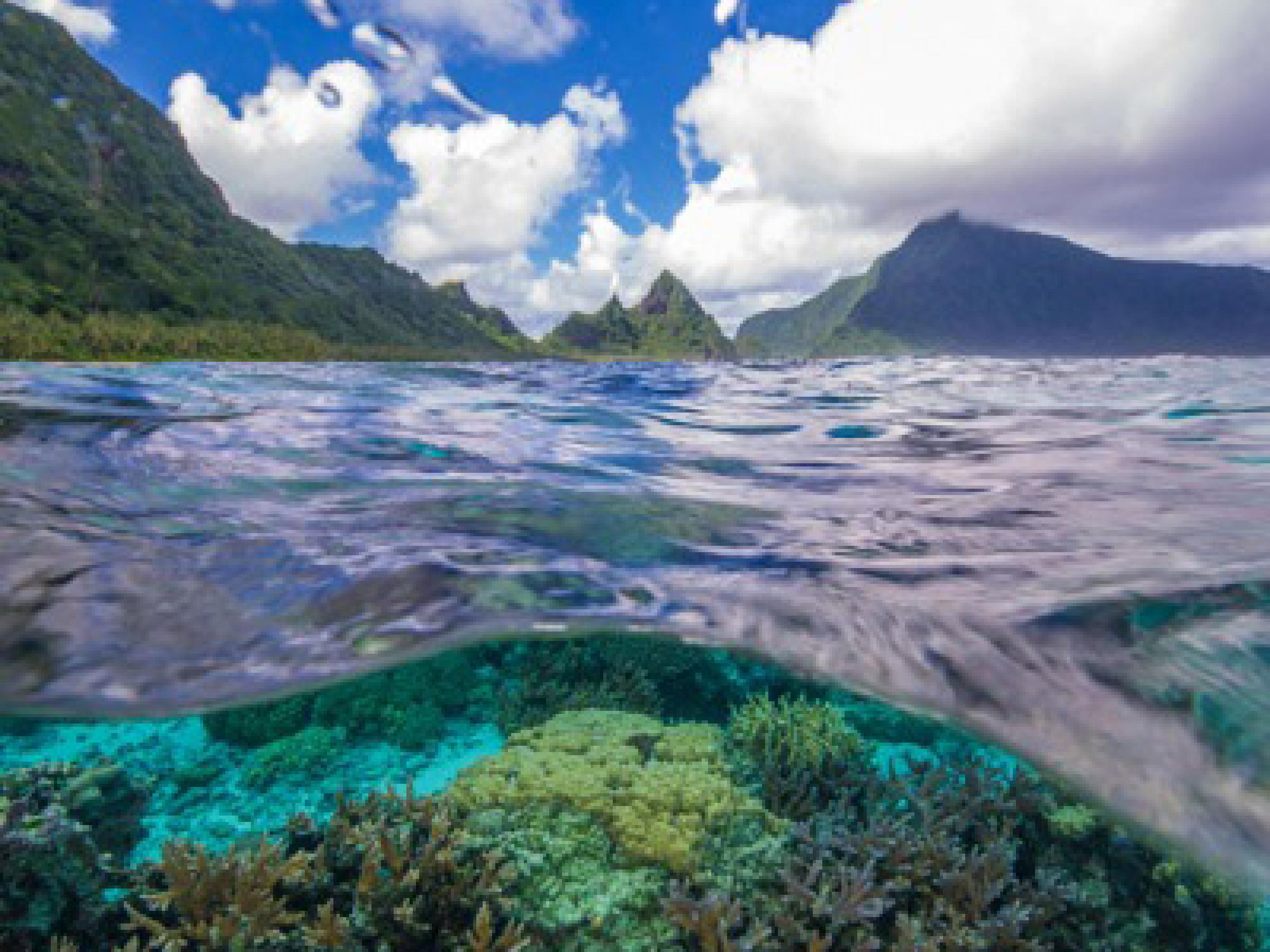 Coral reef and mountain peaks in the Manu’a Islands Coral reef and mountain peaks in the Manu’a Islands