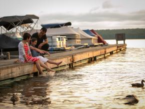Family enjoying the sunset at Lake Wallenpaupack in the Pocono Mountains Family enjoying the sunset at Lake Wallenpaupack in the Pocono Mountains
