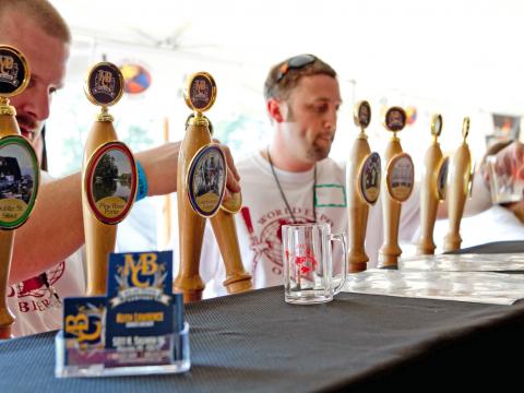 Sampling the diverse taps at the World Expo of Beer Sampling the diverse taps at the World Expo of Beer
