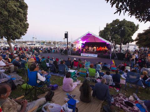 Crowds listen to the live band performing during Marina del Rey’s Summer Concert Series Crowds listen to the live band performing during Marina del Rey’s Summer Concert Series