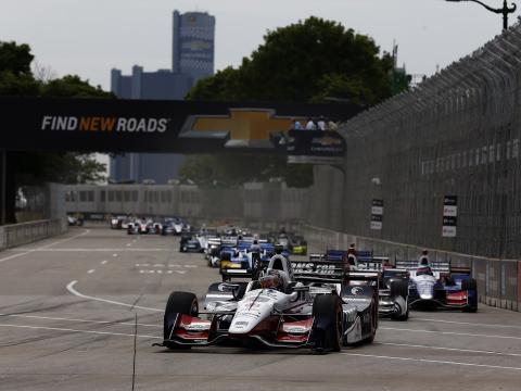 Grand Prix cars racing through Detroit Grand Prix cars racing through Detroit