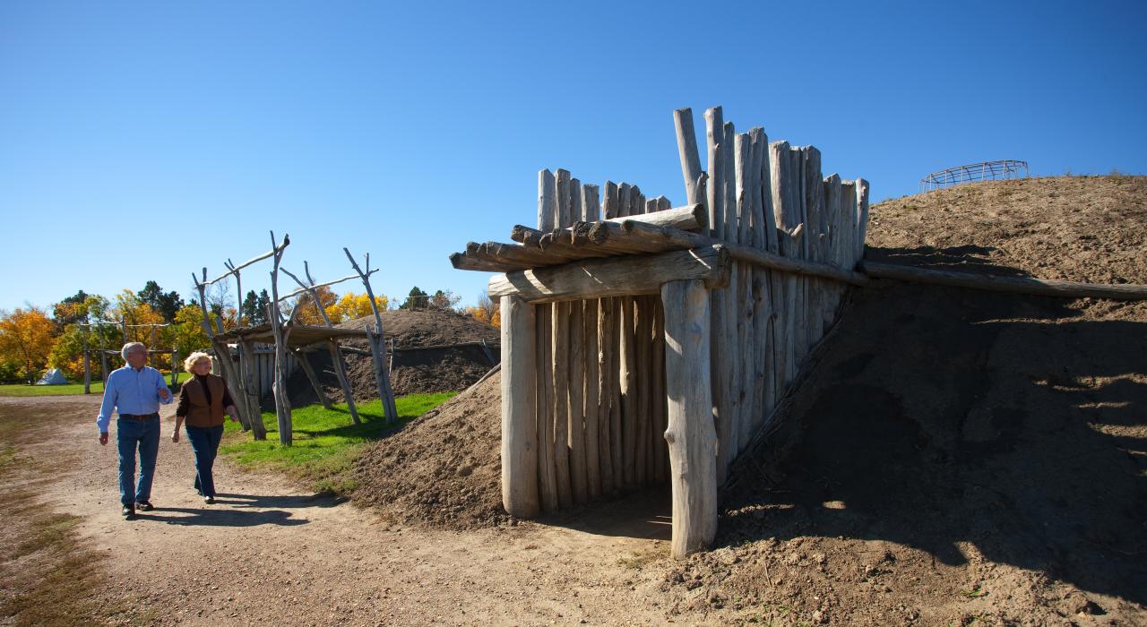 Historic buildings at Fort Abraham Lincoln State Park's On-A-Slant Indian Village offer a glimpse into the lives and traditions of the Mandan Nation in the 1500s Historic buildings at Fort Abraham Lincoln State Park's On-A-Slant Indian Village offer a glimpse into the lives and traditions of the Mandan Nation in the 1500s