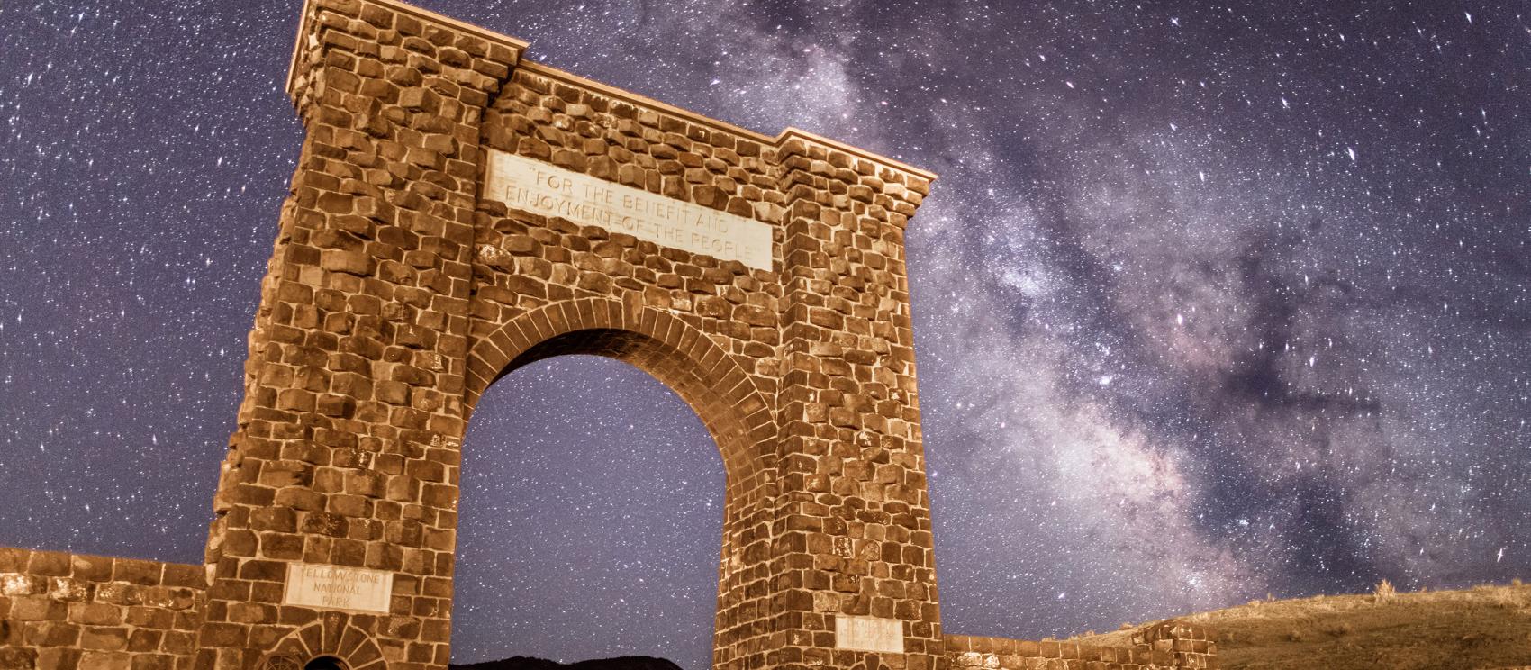 Starry skies above Roosevelt Arch, marking the Gardiner entrance to Yellowstone National Park Starry skies above Roosevelt Arch, marking the Gardiner entrance to Yellowstone National Park