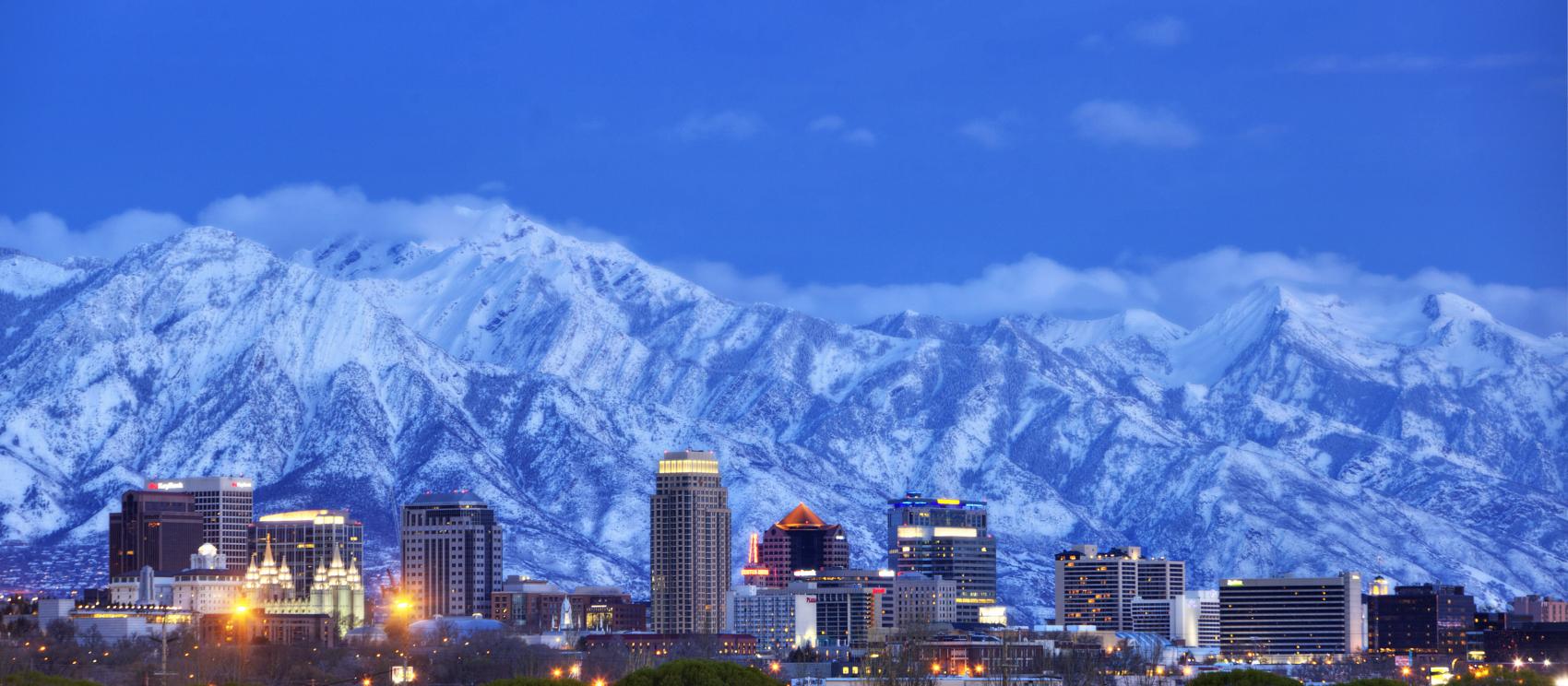 The Salt Lake City skyline and the snow-covered Wasatch Mountains The Salt Lake City skyline and the snow-covered Wasatch Mountains
