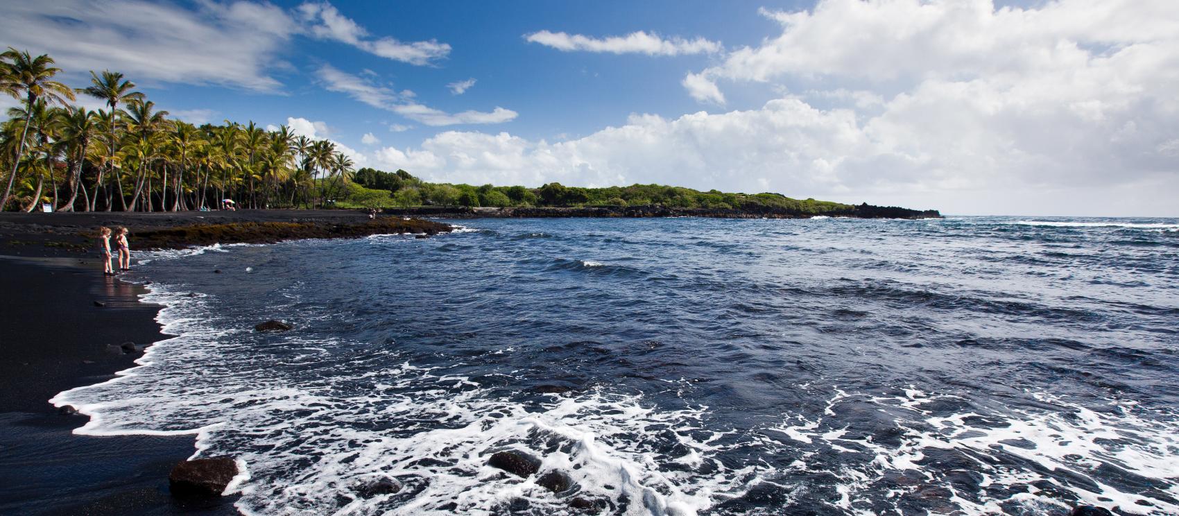 Punaluʻu Black Sand Beach on Hawaiʻi Island, shaped by millions of years of volcanic activity Punaluʻu Black Sand Beach on Hawaiʻi Island, shaped by millions of years of volcanic activity
